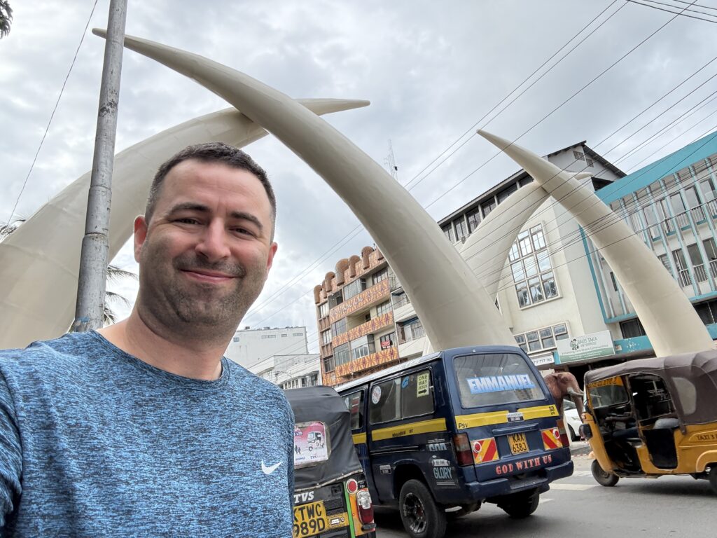 Eric from Foreign Option hanging out in Mombasa Kenya at the elephant tusks monument.