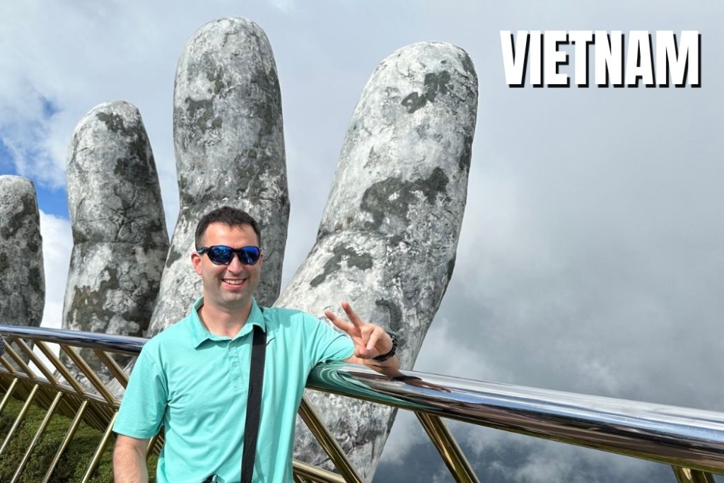 American expat visits Ba Na hills near Da Nang vietnam at the Golden Hands bridge.